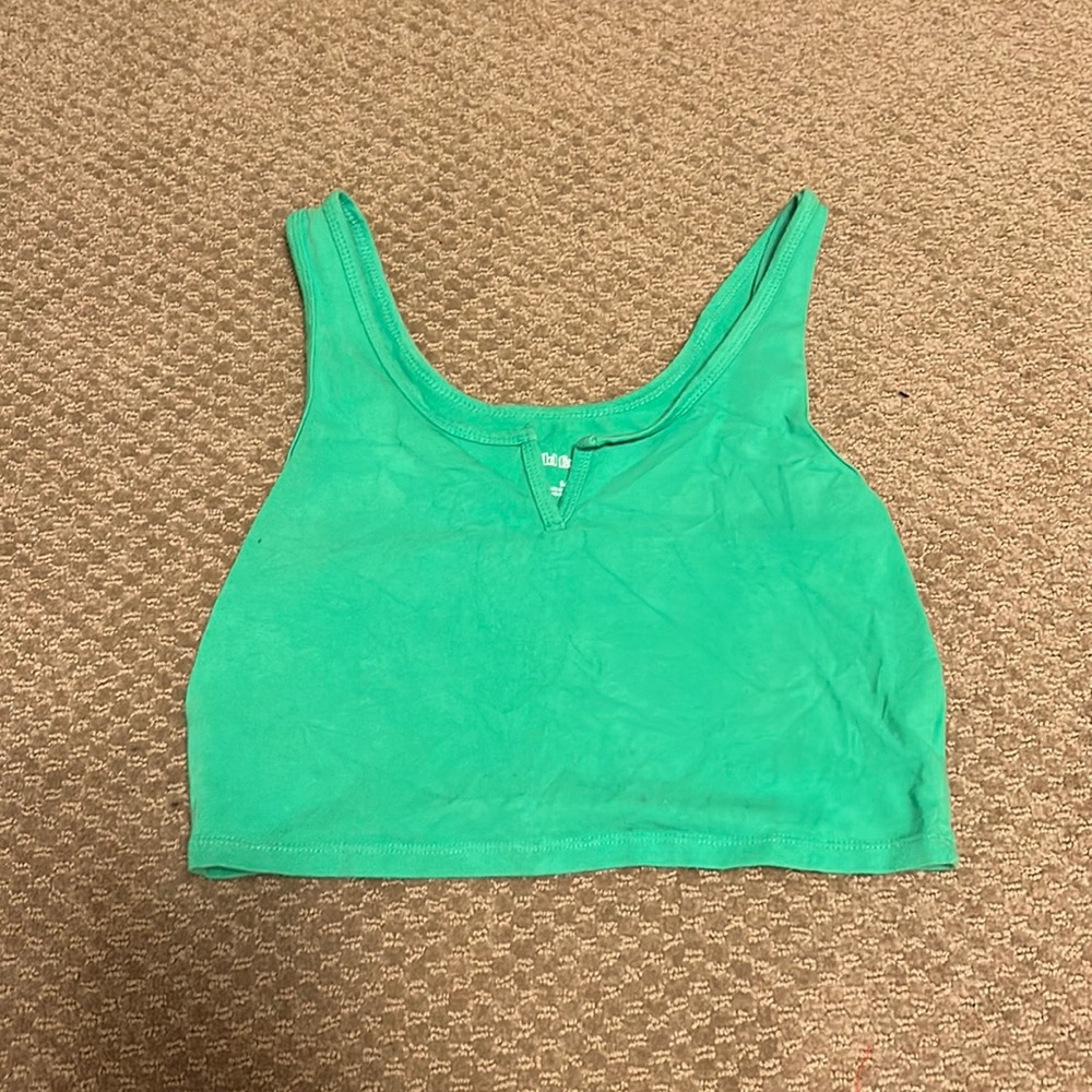 Green tank top with notch